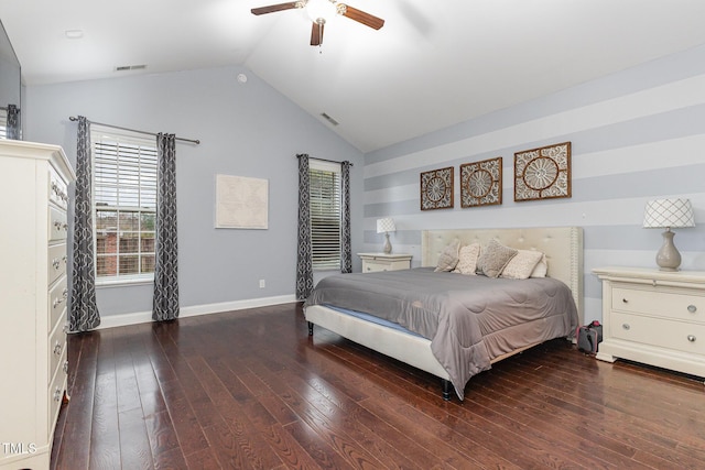 bedroom with dark hardwood / wood-style floors, ceiling fan, and lofted ceiling