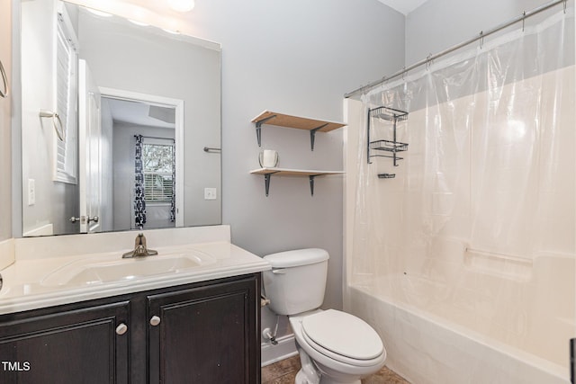 full bathroom with tile patterned flooring, vanity, shower / tub combo, and toilet