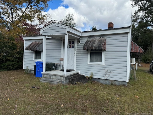 exterior space with a front lawn