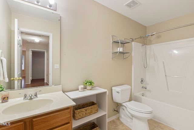 full bathroom featuring shower / bathtub combination, visible vents, toilet, vanity, and tile patterned flooring