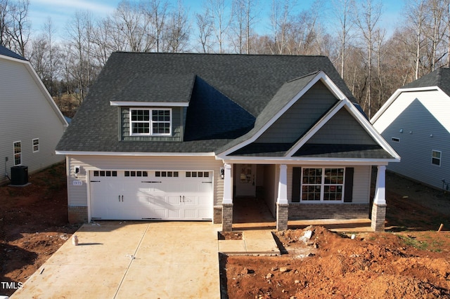 craftsman inspired home with central AC and a porch