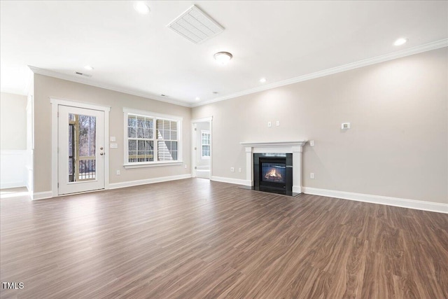 1975 Meadowview Dr, Graham, NC 27253 - unfurnished living room featuring a fireplace with flush hearth, crown molding, baseboards, wood finished floors, and recessed lighting