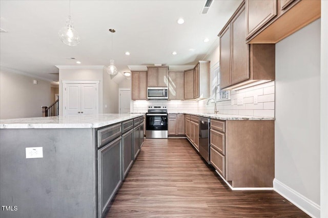 1975 Meadowview Dr, Graham, NC 27253 - kitchen featuring decorative backsplash, crown molding, light stone countertops, appliances with stainless steel finishes, and dark wood-style floors