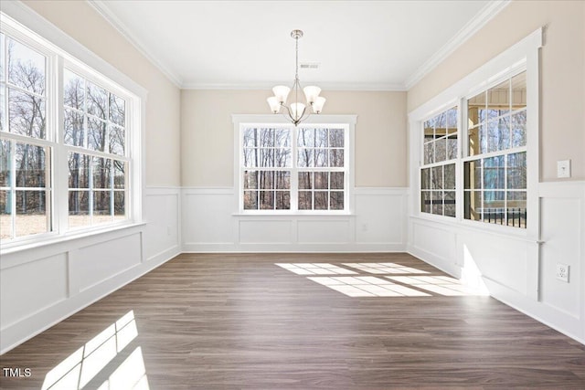 1975 Meadowview Dr, Graham, NC 27253 - unfurnished dining area with ornamental molding, wood finished floors, a notable chandelier, and visible vents