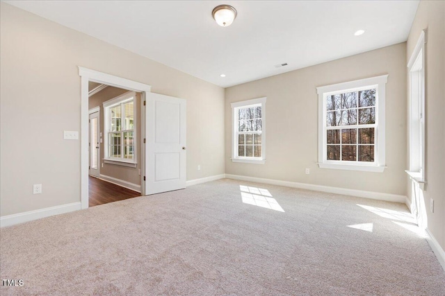 1975 Meadowview Dr, Graham, NC 27253 - carpeted empty room featuring baseboards and recessed lighting