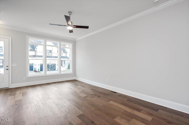 unfurnished room with hardwood / wood-style floors, ceiling fan, and ornamental molding