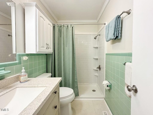 bathroom with vanity, crown molding, a shower with shower curtain, toilet, and tile walls