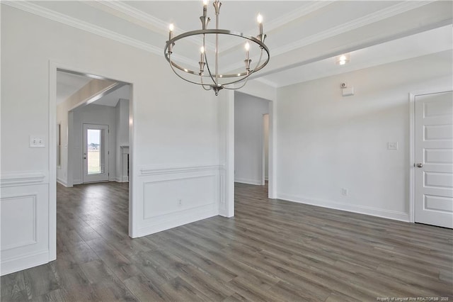 unfurnished dining area with an inviting chandelier, crown molding, a raised ceiling, and dark wood finished floors