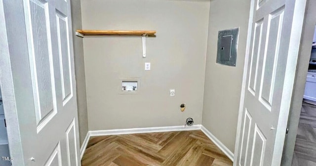 laundry room with parquet flooring, washer hookup, and electric panel