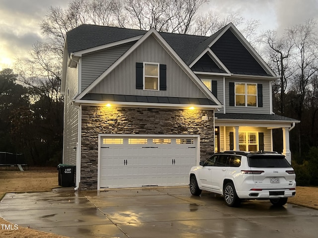 view of front of home with a garage