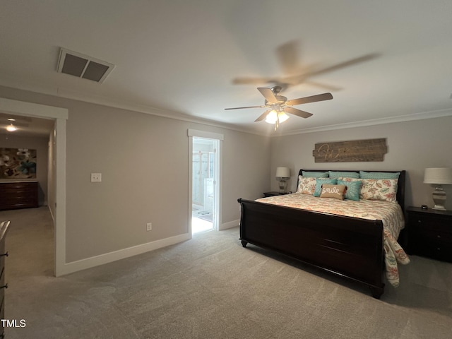 bedroom featuring connected bathroom, ceiling fan, crown molding, and light carpet