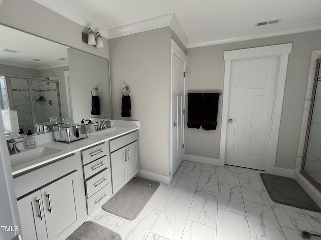 bathroom with vanity, a shower with door, and crown molding