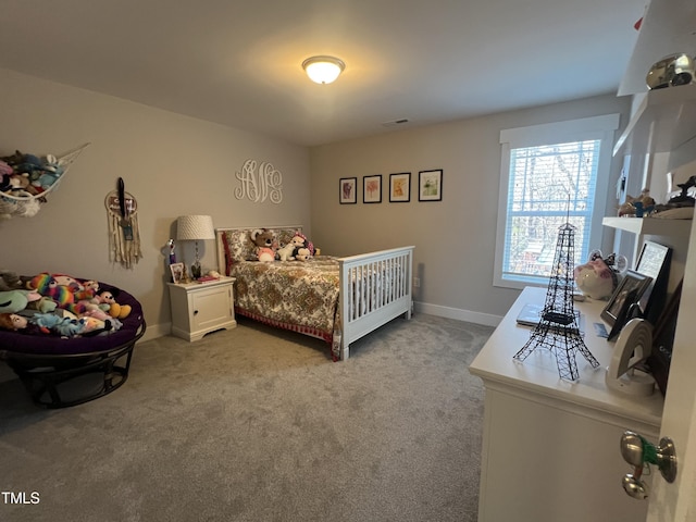 bedroom with light colored carpet