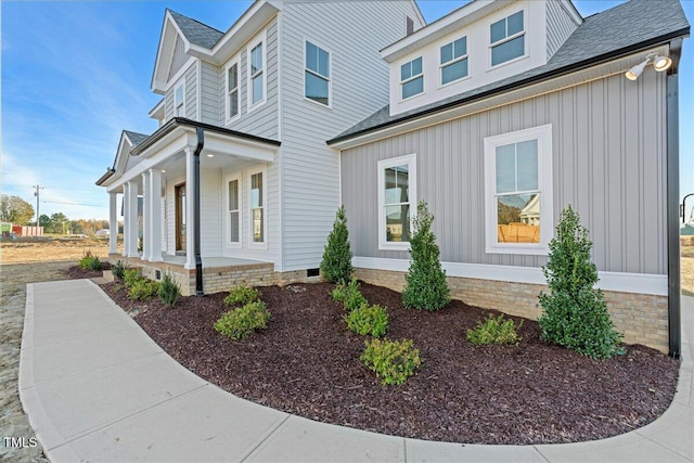 view of home's exterior featuring a porch