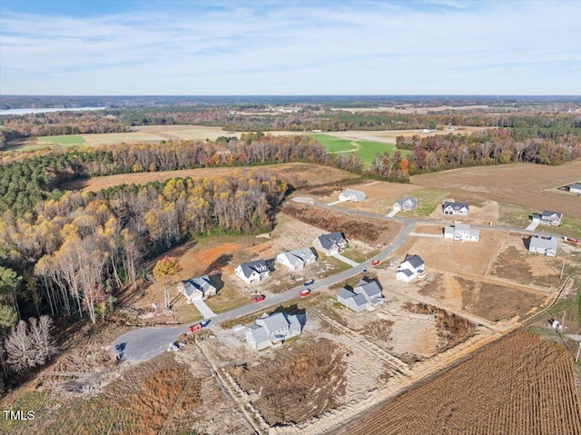 birds eye view of property featuring a rural view