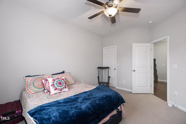 carpeted bedroom featuring ceiling fan