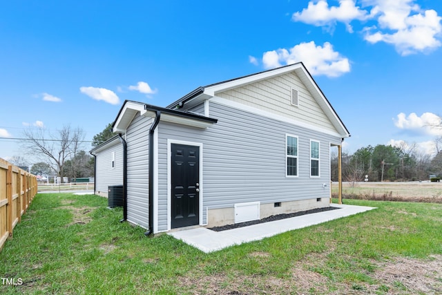 rear view of house with a lawn