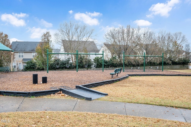 view of home's community featuring a yard