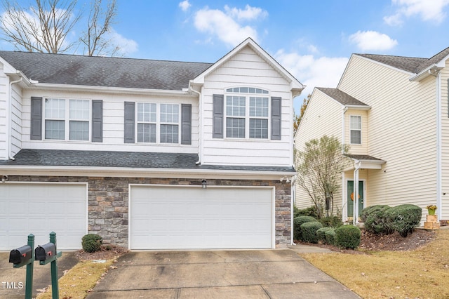 view of front of home with a garage