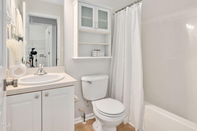 full bathroom with tile patterned flooring, vanity, toilet, and shower / bathtub combination with curtain