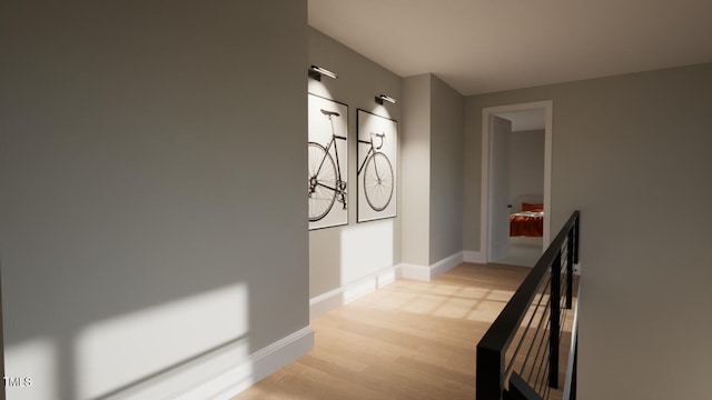 hallway with light hardwood / wood-style floors