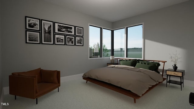 carpeted bedroom featuring a water view