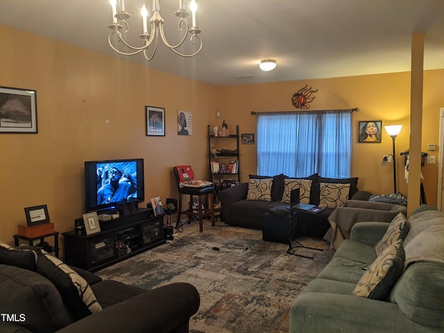 living room with an inviting chandelier