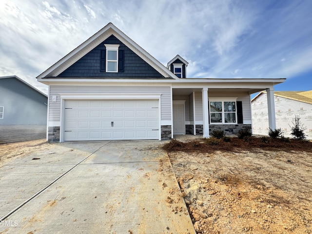 view of front of property with a garage