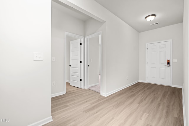 foyer with light hardwood / wood-style flooring