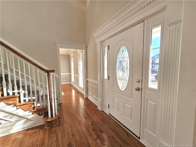 foyer entrance with dark wood-type flooring