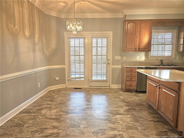 kitchen with pendant lighting, crown molding, a wealth of natural light, and a chandelier