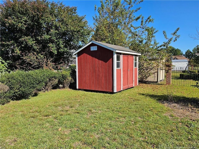 view of outdoor structure with a yard