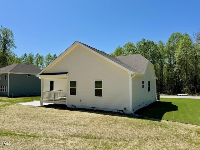 19 Covey Rise Way, Lillington, NC 27546 - rear view of house featuring a lawn and crawl space