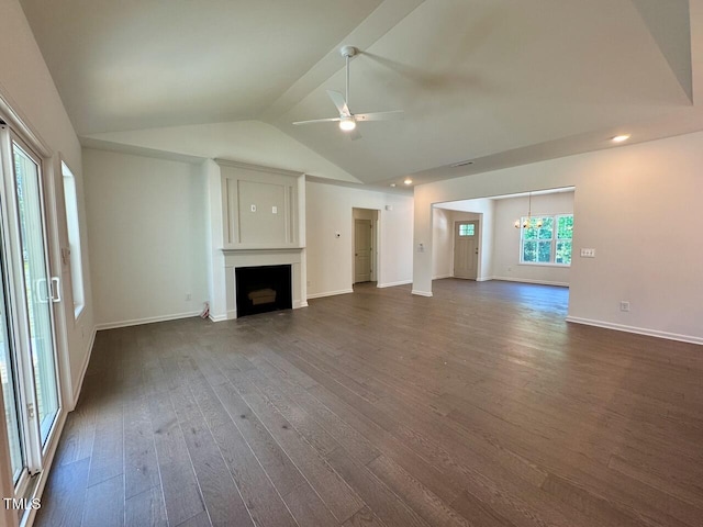 19 Covey Rise Way, Lillington, NC 27546 - unfurnished living room with a fireplace, a chandelier, dark wood-style flooring, vaulted ceiling, and ceiling fan