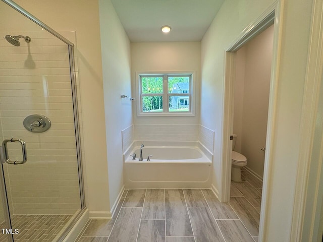19 Covey Rise Way, Lillington, NC 27546 - full bath featuring a stall shower, a bath, and wood finish floors