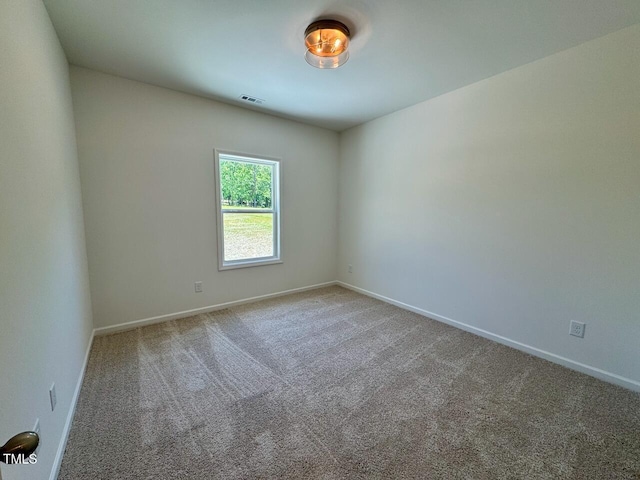 19 Covey Rise Way, Lillington, NC 27546 - carpeted spare room with baseboards