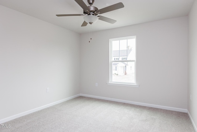 unfurnished room featuring carpet floors and ceiling fan