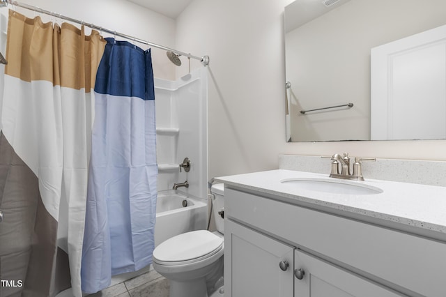 full bathroom featuring toilet, tile patterned floors, vanity, and shower / bath combo with shower curtain