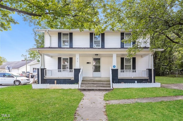 view of front of house featuring a porch and a front yard