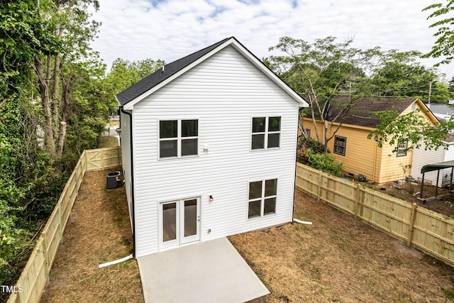 back of property featuring a patio area and cooling unit