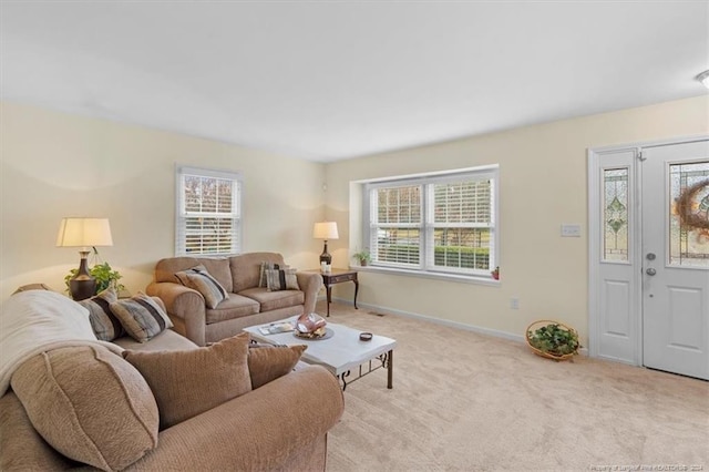 living room featuring light colored carpet