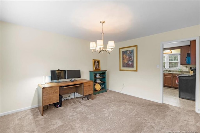 office with light colored carpet and a chandelier