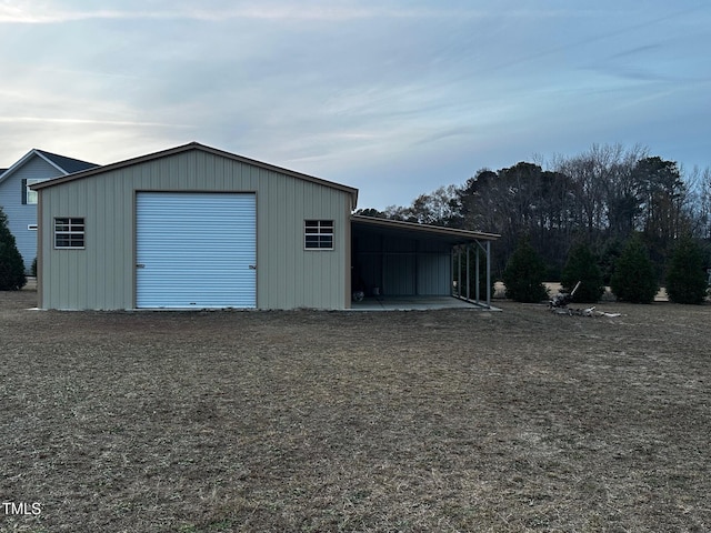 garage with a carport