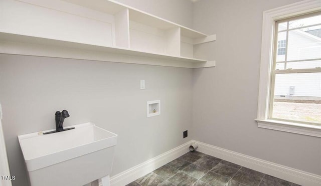 laundry area featuring hookup for a washing machine and sink