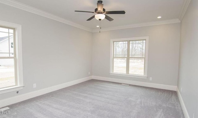 empty room with plenty of natural light and light carpet