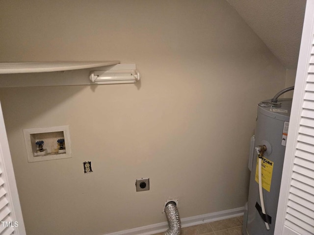 laundry room with hookup for an electric dryer, washer hookup, light tile patterned flooring, and water heater