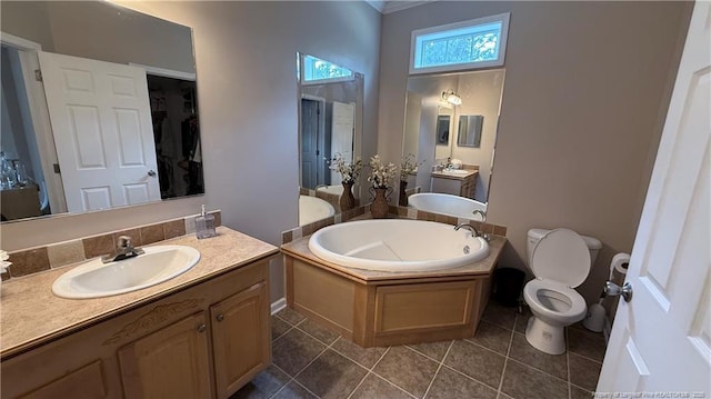 full bath with crown molding, tile patterned flooring, vanity, toilet, and a bath