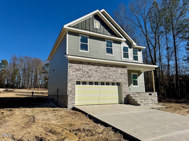 view of side of property featuring a garage