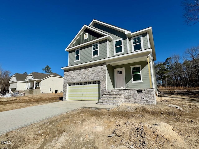 craftsman house with a garage