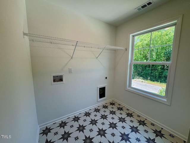 45 Covey Rise Way, Lillington, NC 27546 - laundry room featuring plenty of natural light, hookup for an electric dryer, light flooring, and washer hookup